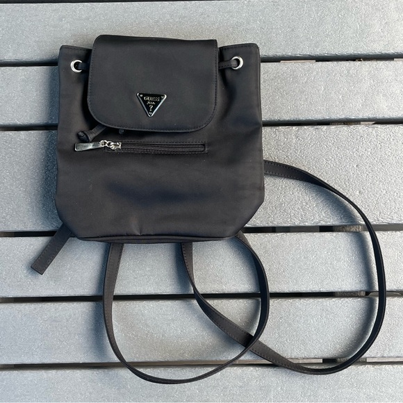 Guess; Mini Black Backpack; Magnetic Closure & Drawstring; NWT; 8.5 x 3 x 8in - Picture 1 of 9
